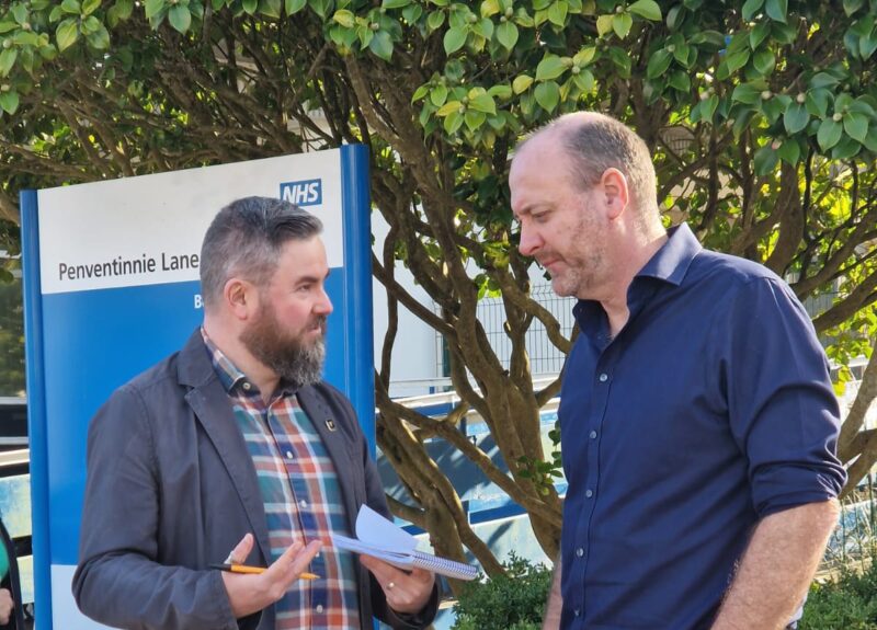 Perran Moon talks to a journalist at the Royal Cornwall Hospital